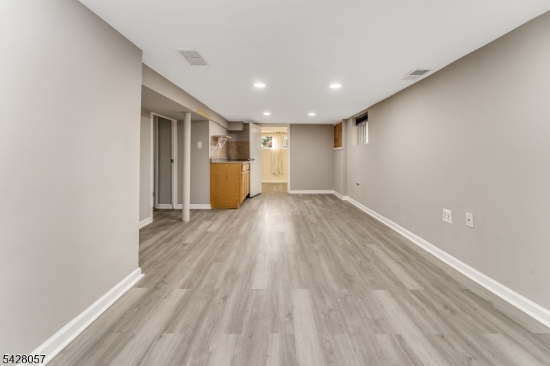 119 Edgewood Road Linden, NJ 07036 - Photo 19 of 31 a view of an empty room with wooden floor