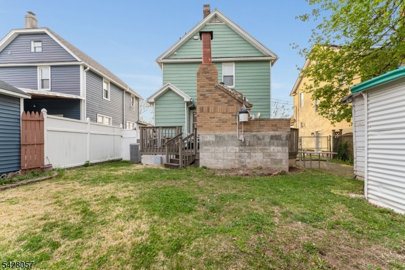 119 Edgewood Road Linden, NJ 07036 - Photo 23 of 31 a view of a house with a yard and garage