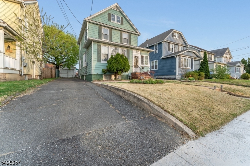 119 Edgewood Road Linden, NJ 07036 - Photo 28 of 31 a front view of a house with a yard
