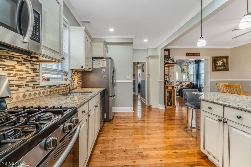 119 Edgewood Road Linden, NJ 07036 - Photo 10 of 31 a large kitchen with stainless steel appliances granite countertop a stove and a sink