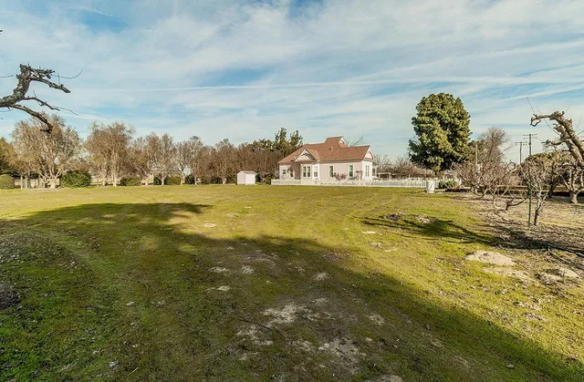 a view of swimming pool with a yard