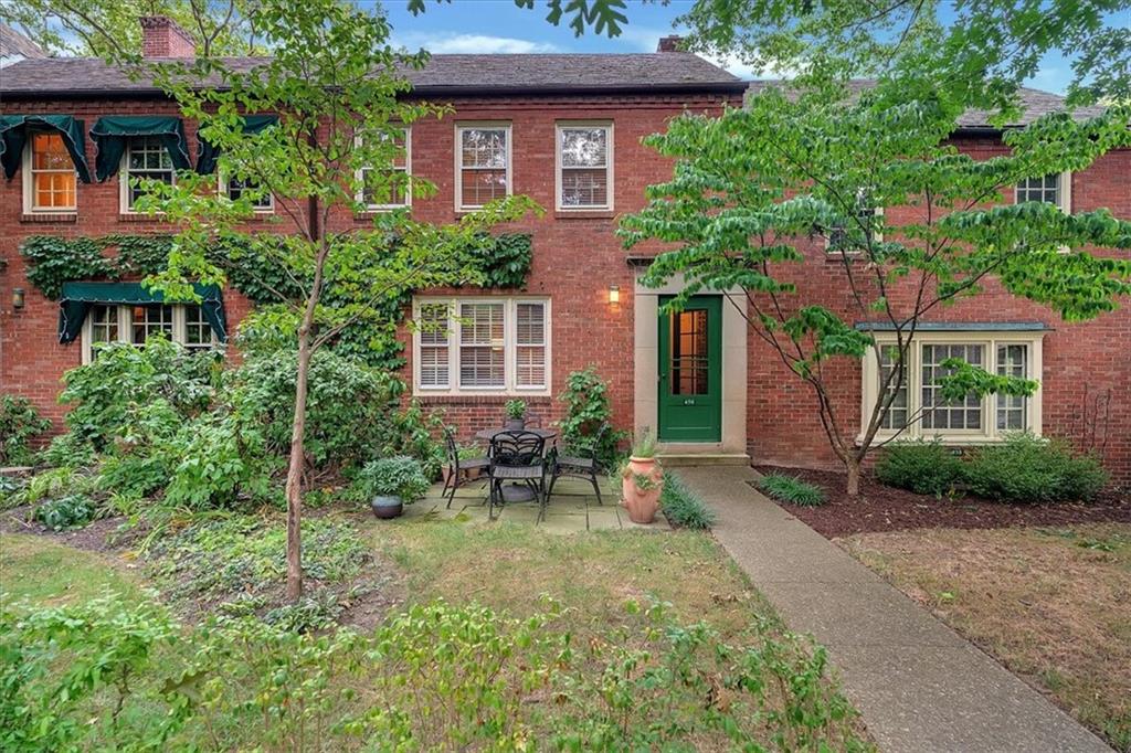 456 Sulgrave Road Pittsburgh, PA 15211 - Photo 1 of 12 a view of a patio with table and chairs and potted plants