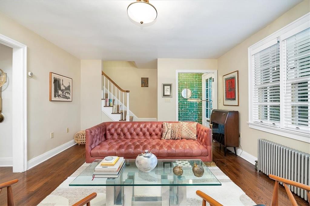 456 Sulgrave Road Pittsburgh, PA 15211 - Photo 3 of 12 a living room with furniture fireplace and a table