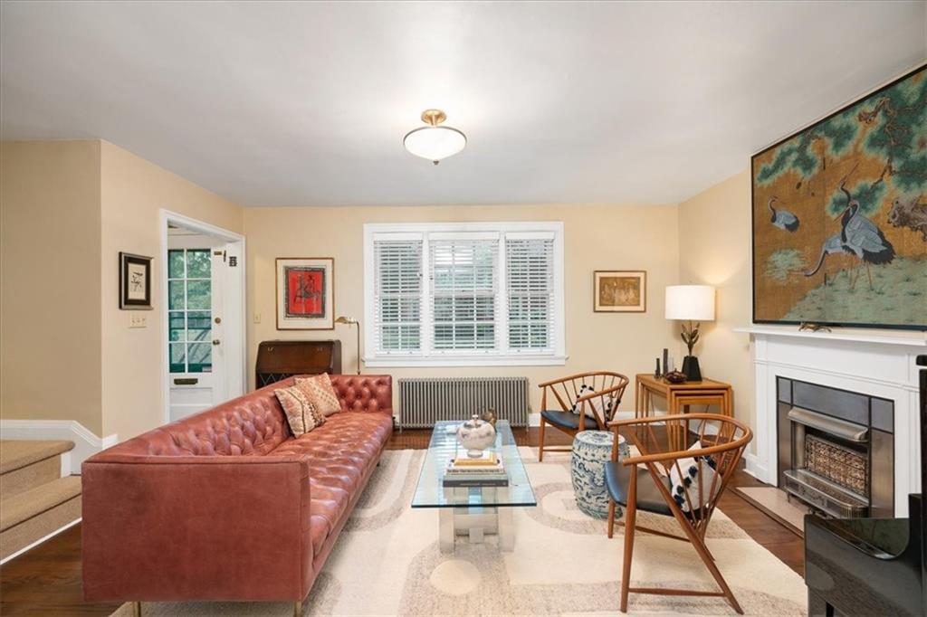 456 Sulgrave Road Pittsburgh, PA 15211 - Photo 4 of 12 a living room with furniture fireplace and flat screen tv