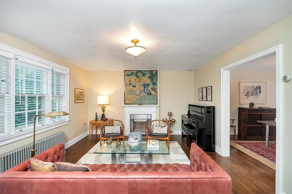 456 Sulgrave Road Pittsburgh, PA 15211 - Photo 6 of 12 a living room with furniture large window and a table