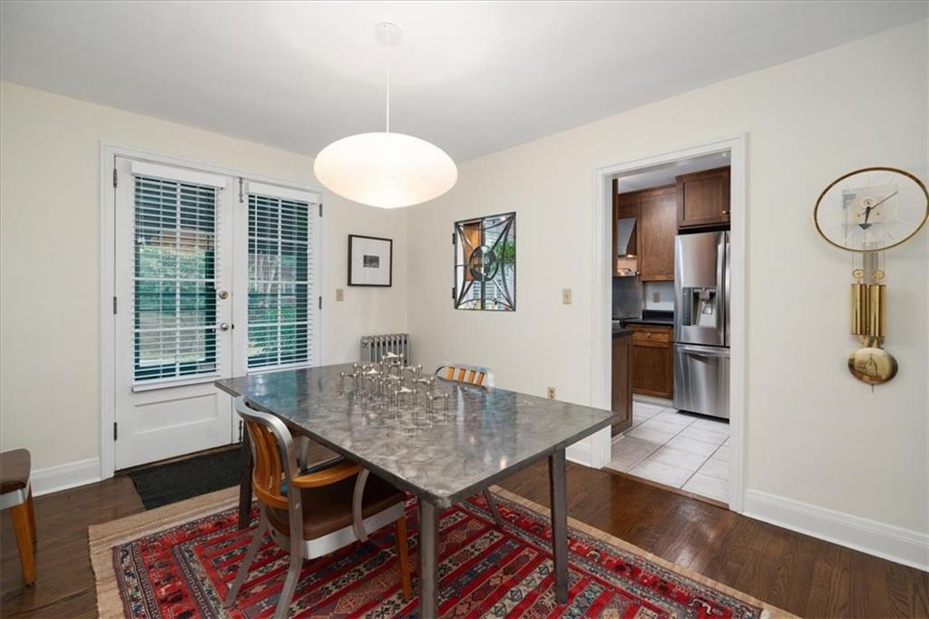 456 Sulgrave Road Pittsburgh, PA 15211 - Photo 7 of 12 a view of a dining room with furniture and wooden floor