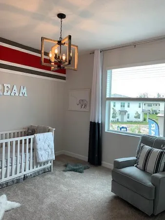 a living room with furniture and window
