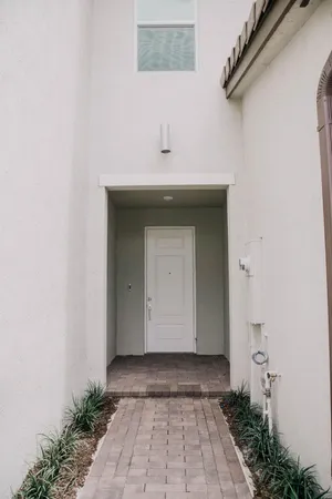 a view of a utility room with a sink