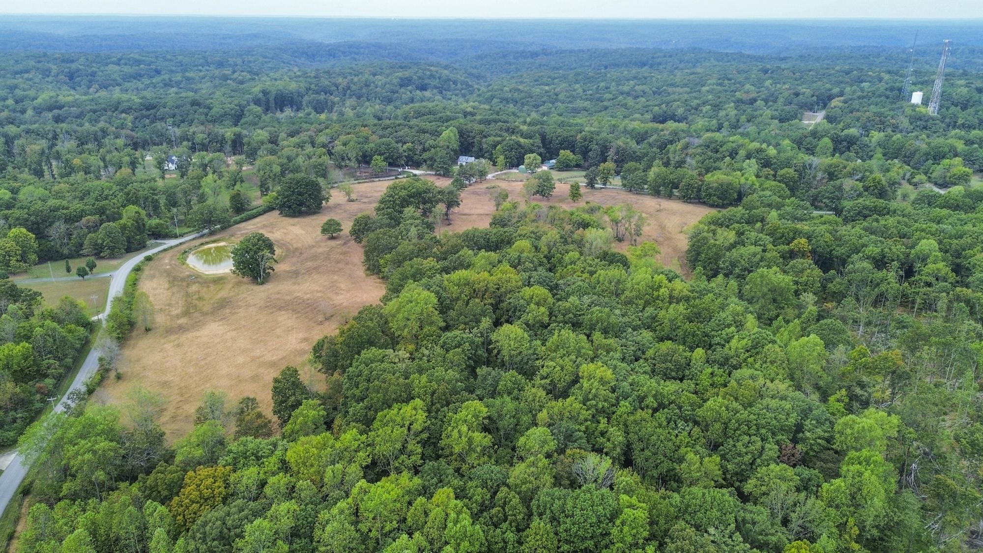 1165 Mt Pleasant Road Kingston Springs, TN 37082 - Photo 2 of 8 an aerial view of residential house with outdoor space