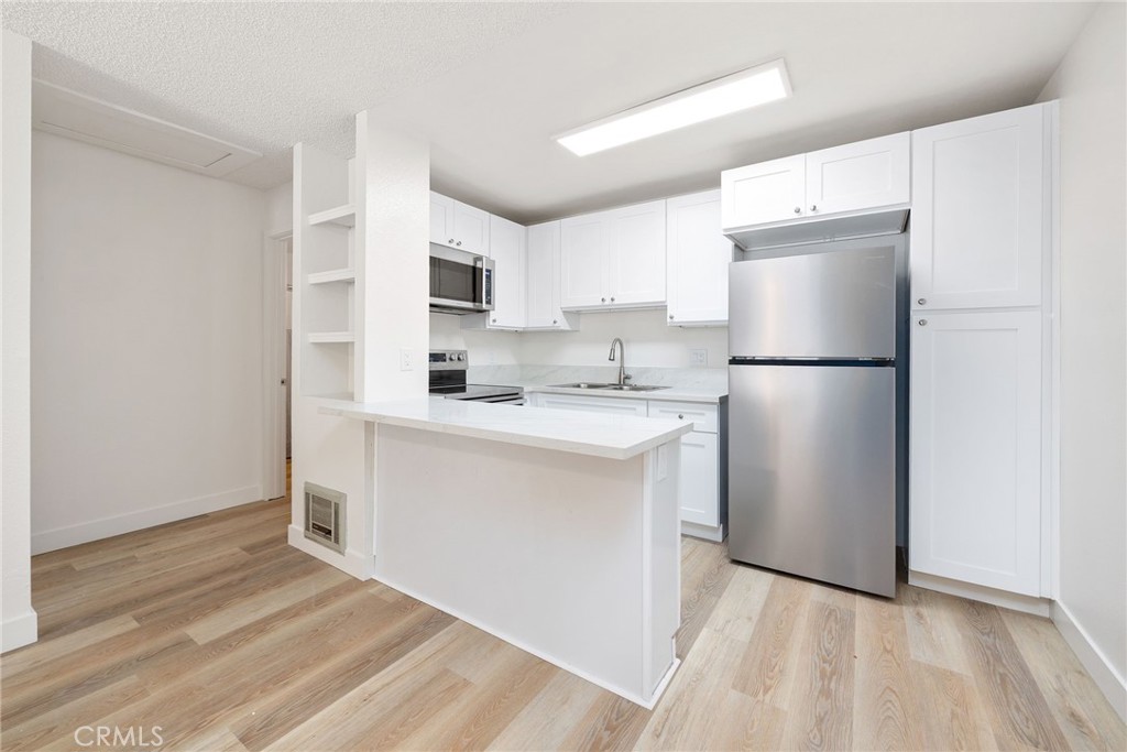 6386 Rancho Mission Road, Unit 318 San Diego, CA 92108 - Photo 7 of 21 Newly Remodeled - Kitchen Cabinets, Counters & Appliances