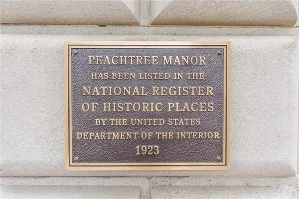 a sign on the side of a building