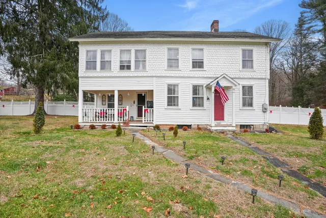 a view of house with outdoor space