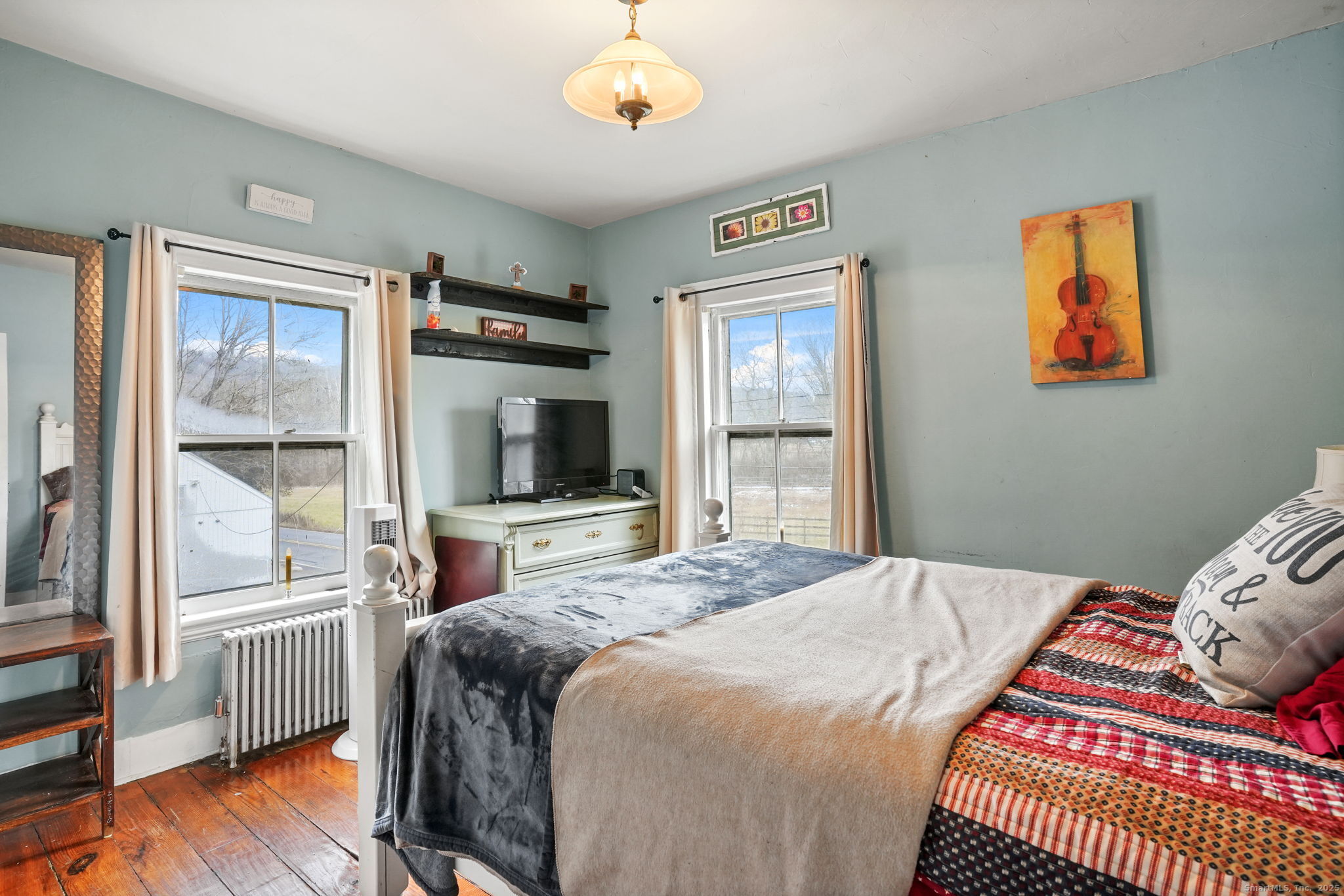 216 Baker Road Roxbury, CT 06783 - Photo 22 of 33 a bedroom with a bed and a window