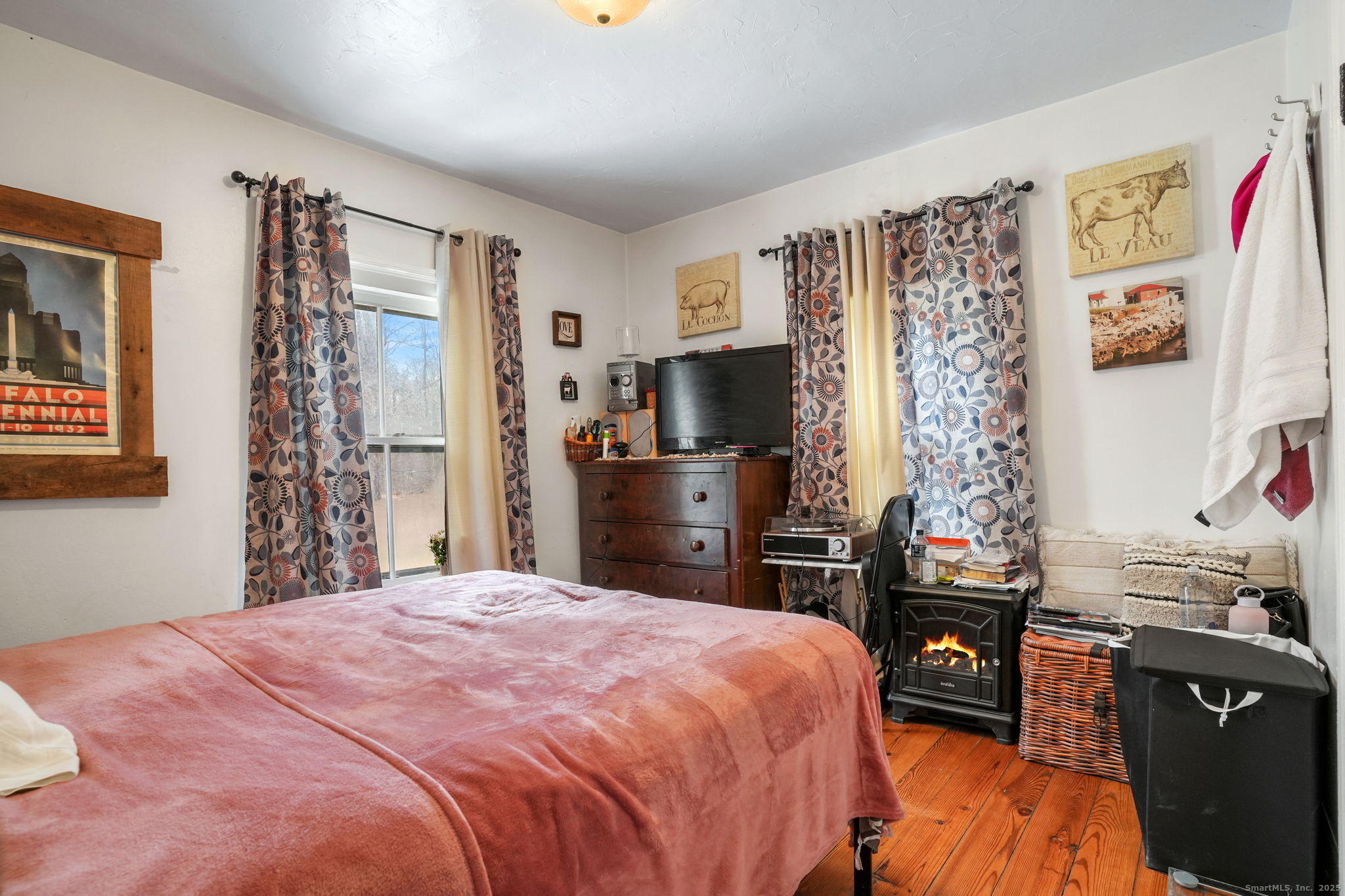 216 Baker Road Roxbury, CT 06783 - Photo 23 of 33 a bedroom with a bed closet and a window