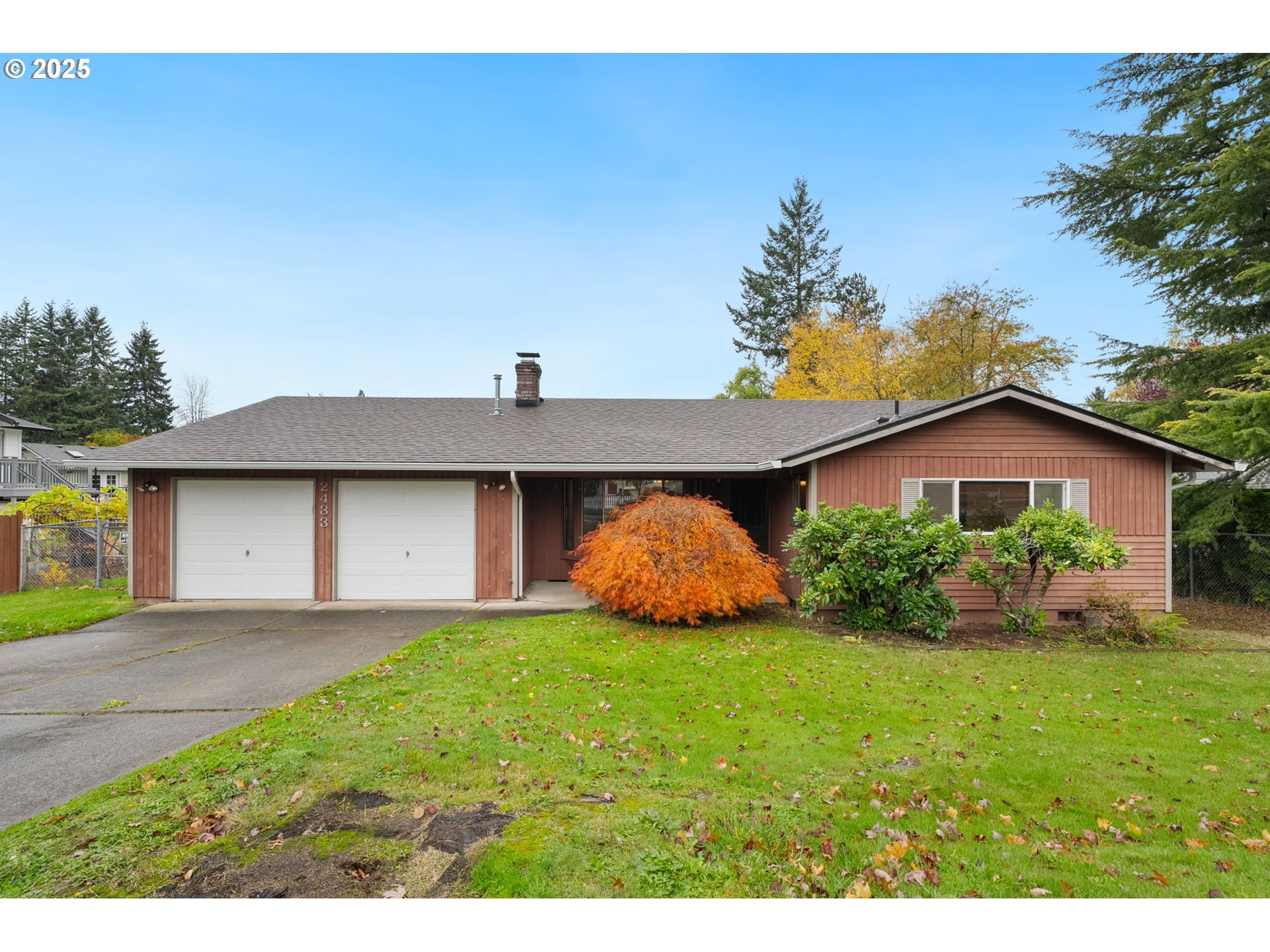 2433 Southeast Barnes Road Gresham, OR 97080 - Photo 2 of 27 a front view of a house with a yard and potted plants
