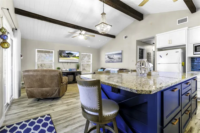 a view of a dining room with furniture