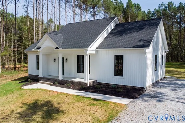a house with yard in front of it