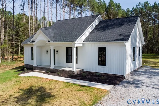 a house with yard in front of it