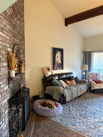 a bedroom with furniture and a couch