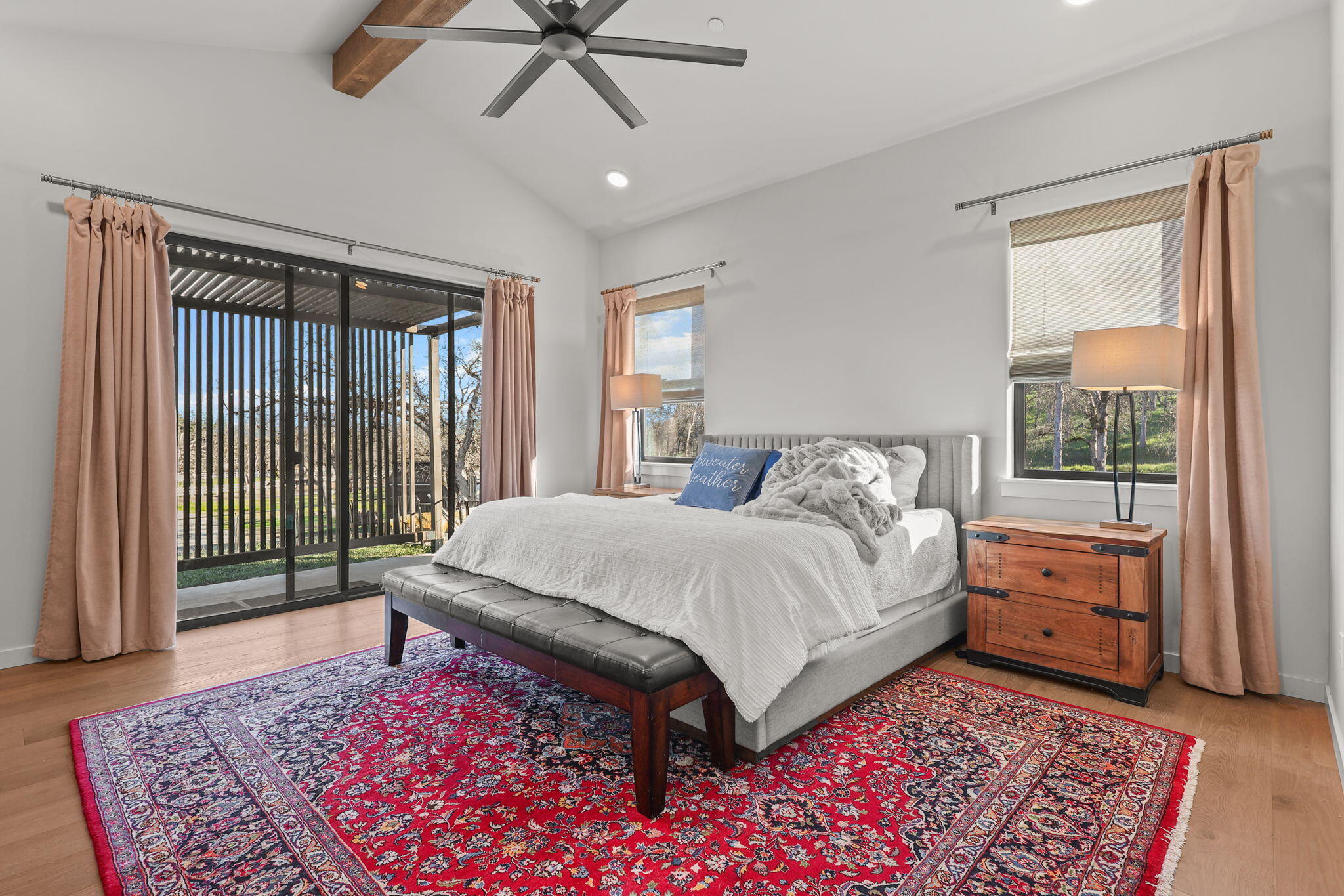 8202 Maynard Road Palo Cedro, CA 96073 - Photo 24 of 74 a bed sitting in a room next to a window