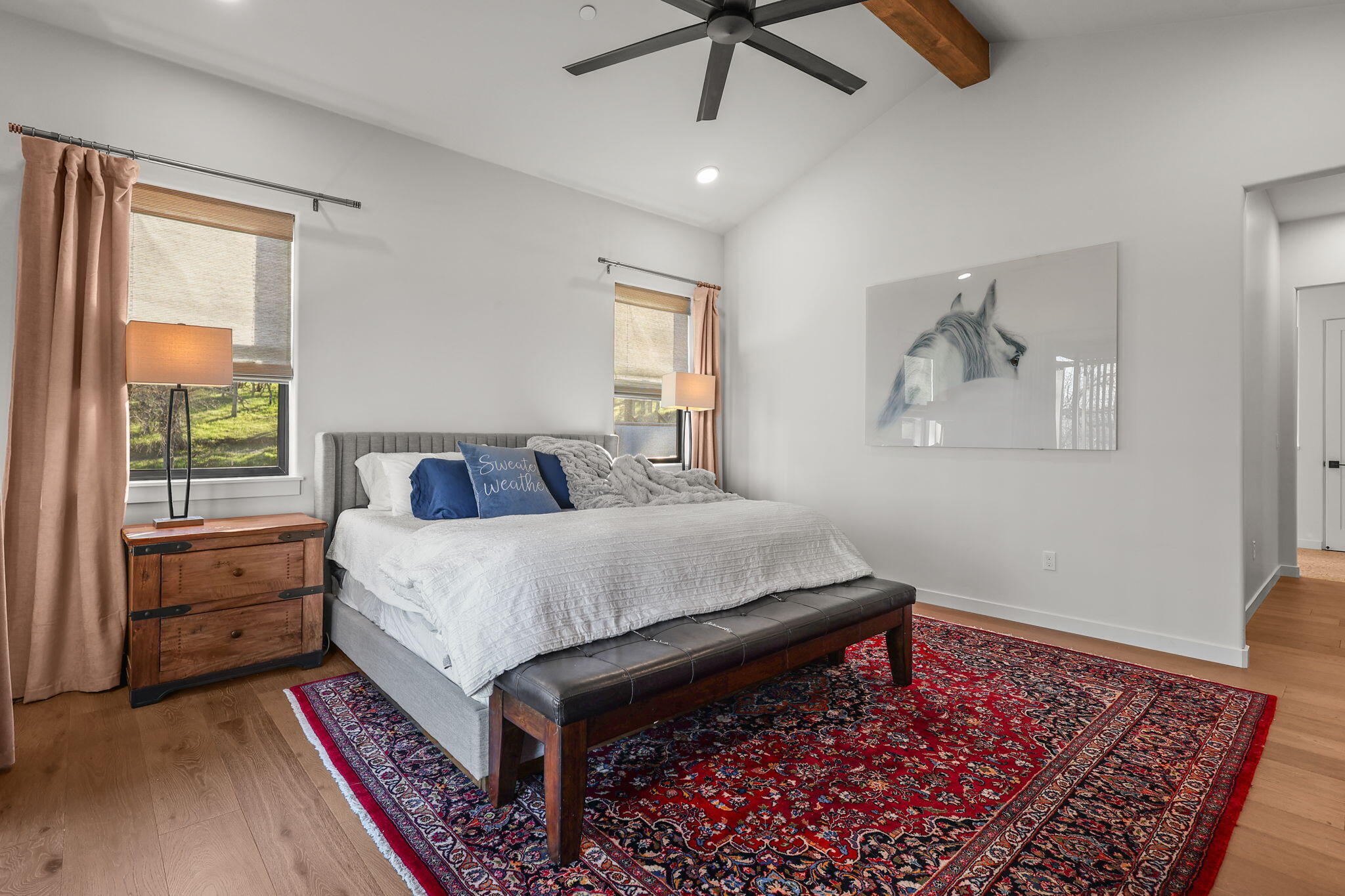 8202 Maynard Road Palo Cedro, CA 96073 - Photo 25 of 74 a bed sitting in a bedroom next to a window