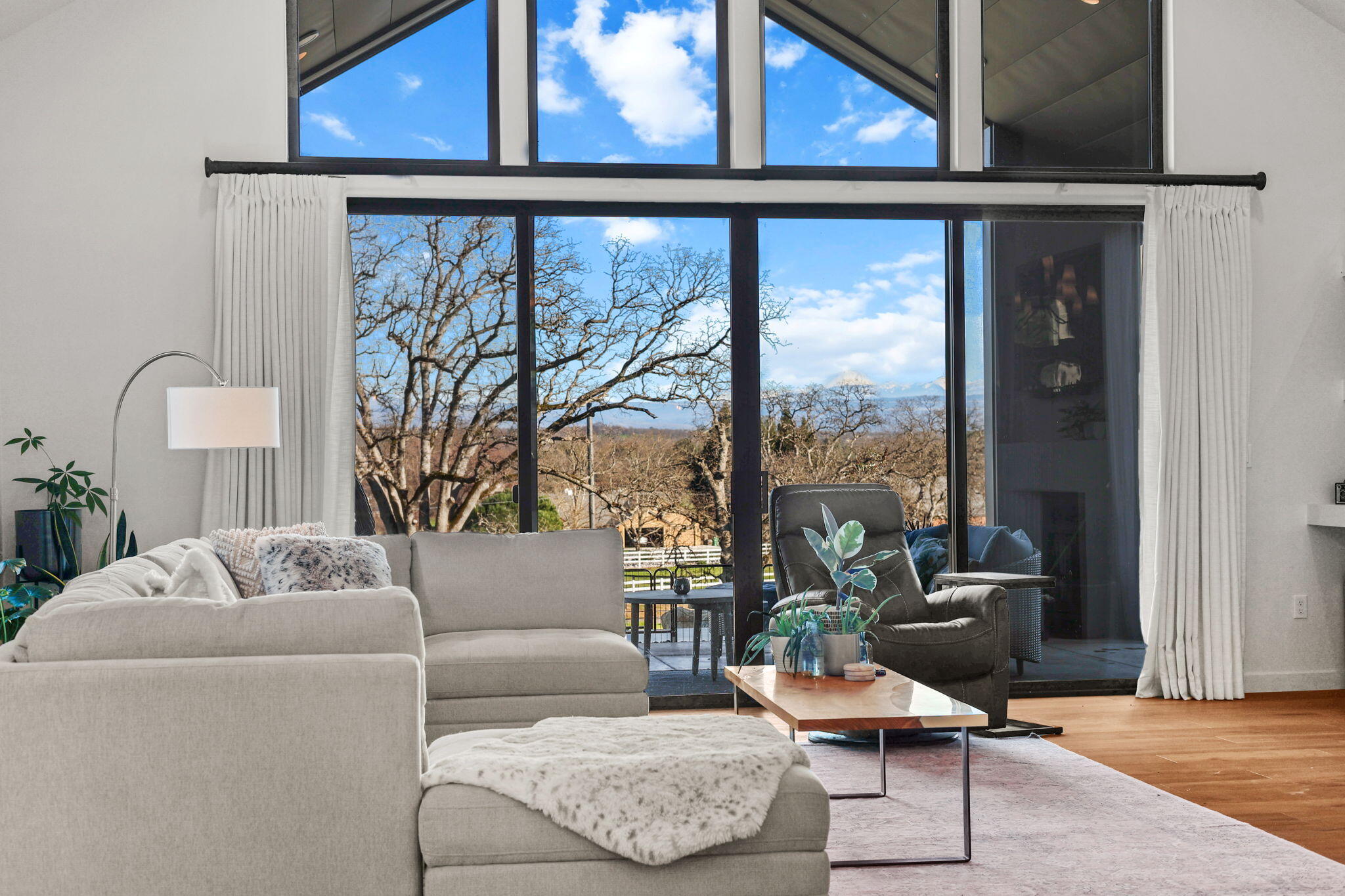 8202 Maynard Road Palo Cedro, CA 96073 - Photo 6 of 74 a living room with furniture and a large window