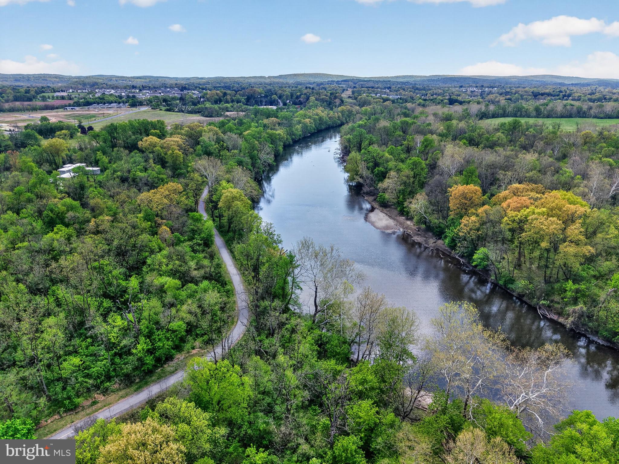 300 Sanatoga Road Pottstown, PA 19465 - Photo 67 of 79 Serene river winding through lush greenery.