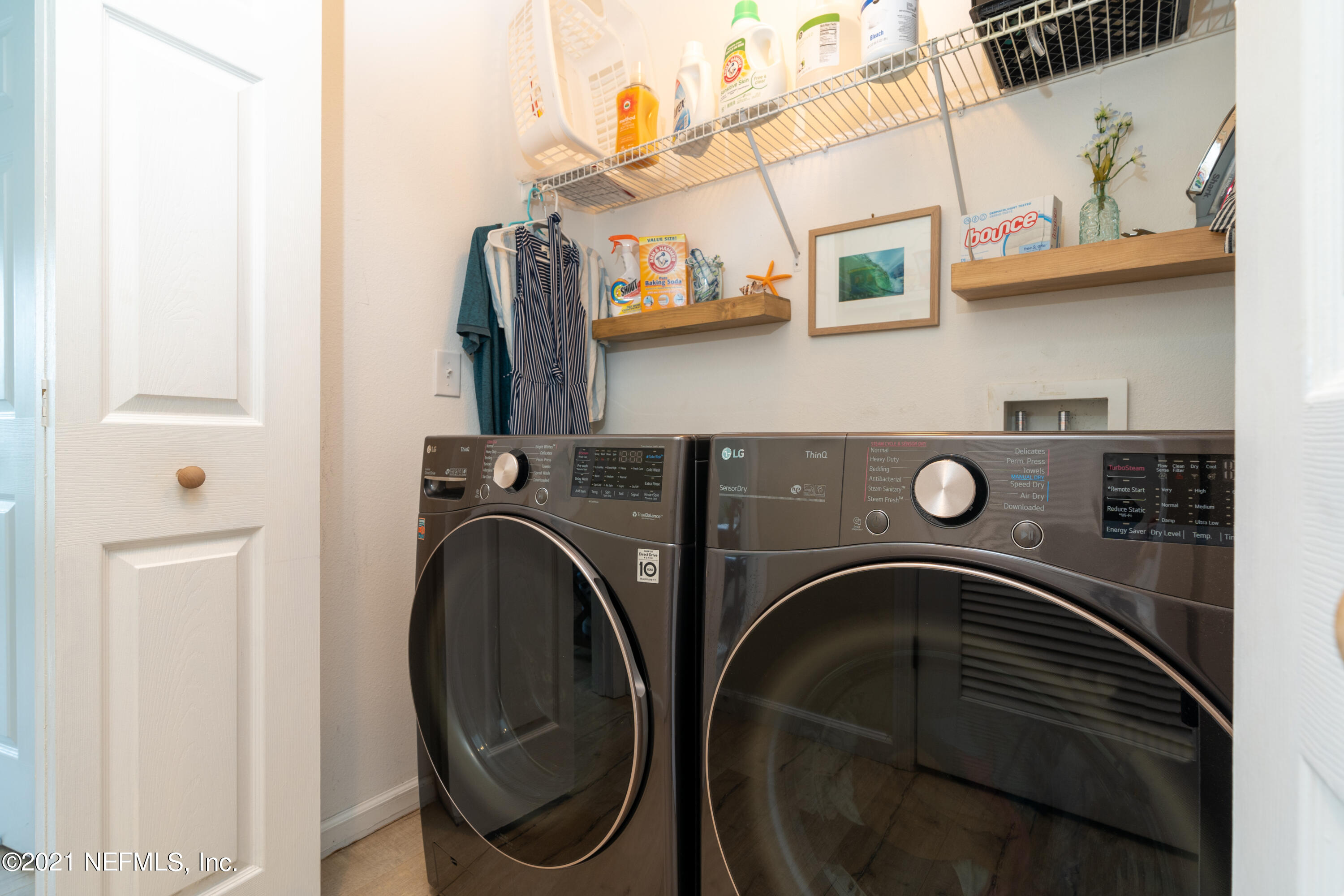 167 Bay Bridge Drive St. Augustine, FL 32080 - Photo 11 of 32 a utility room with dryer and washer