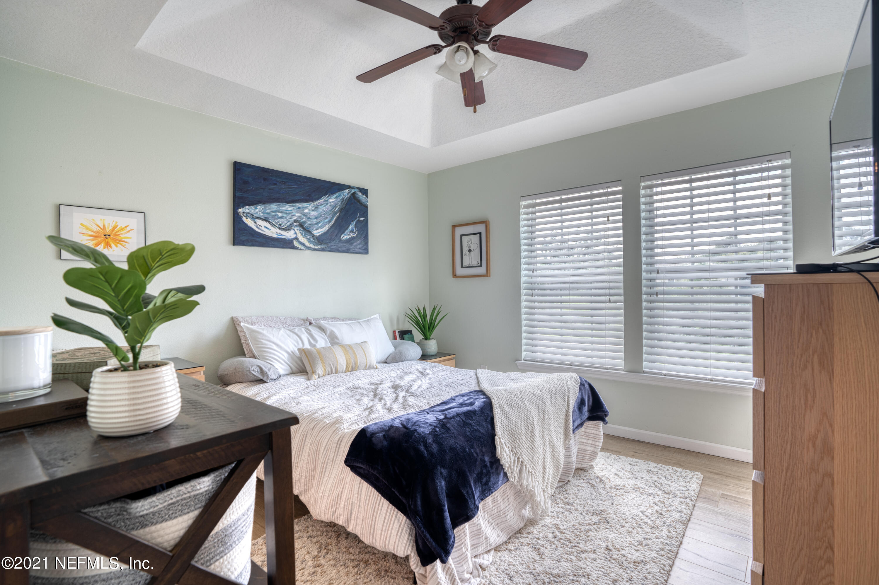 167 Bay Bridge Drive St. Augustine, FL 32080 - Photo 13 of 32 a bedroom with a bed and ceiling fan
