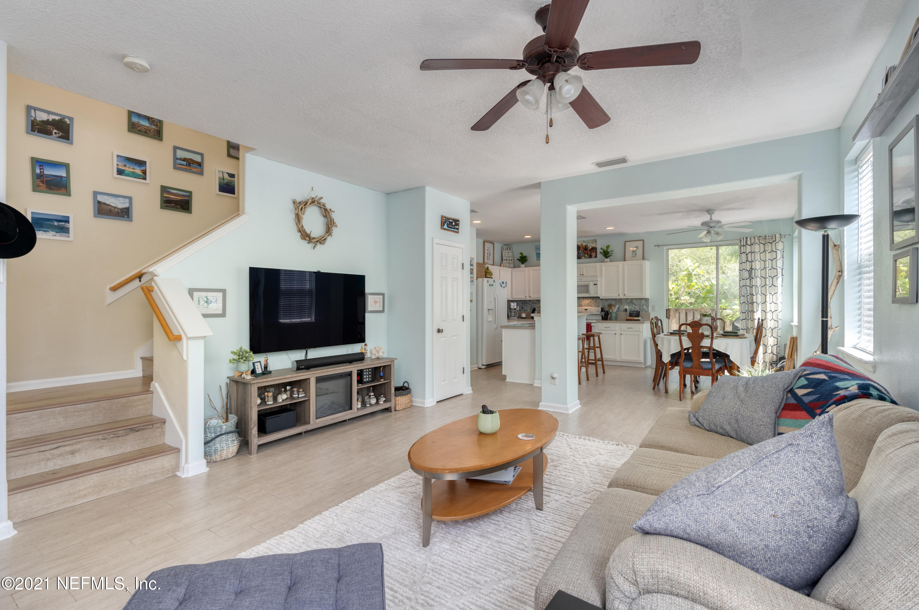167 Bay Bridge Drive St. Augustine, FL 32080 - Photo 18 of 32 a living room with furniture and a flat screen tv