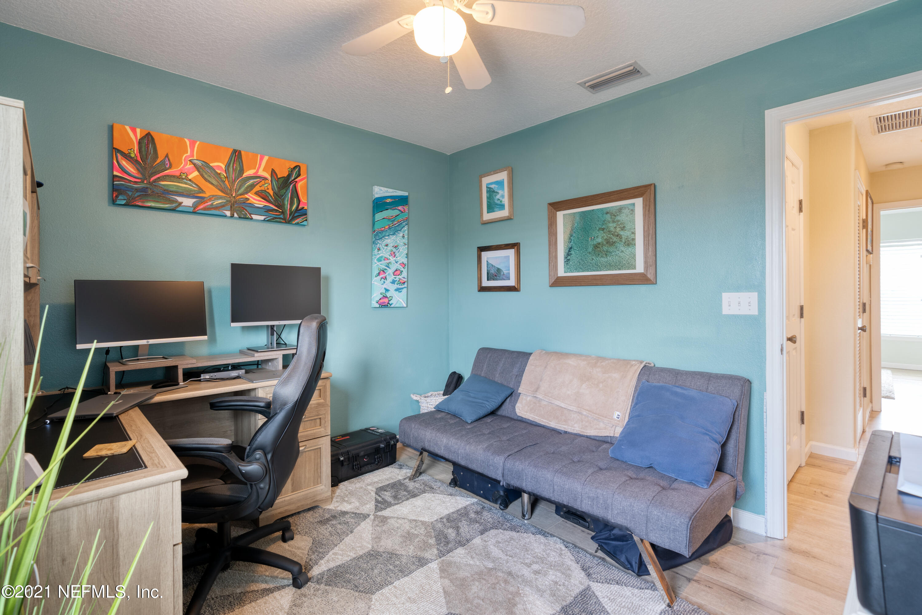 167 Bay Bridge Drive St. Augustine, FL 32080 - Photo 27 of 32 a workspace with furniture and wooden floor