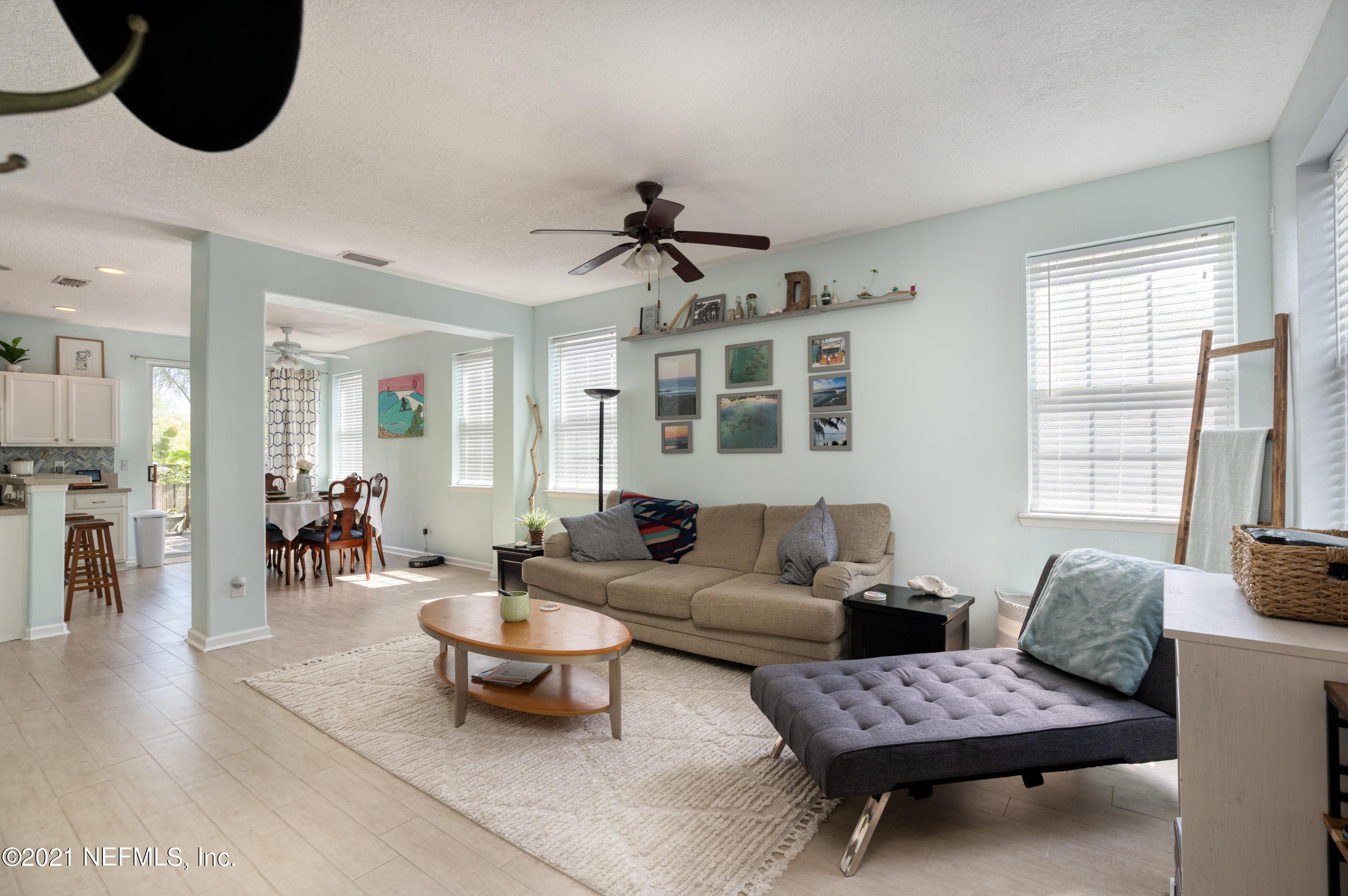 167 Bay Bridge Drive St. Augustine, FL 32080 - Photo 3 of 32 a living room with furniture and wooden floor