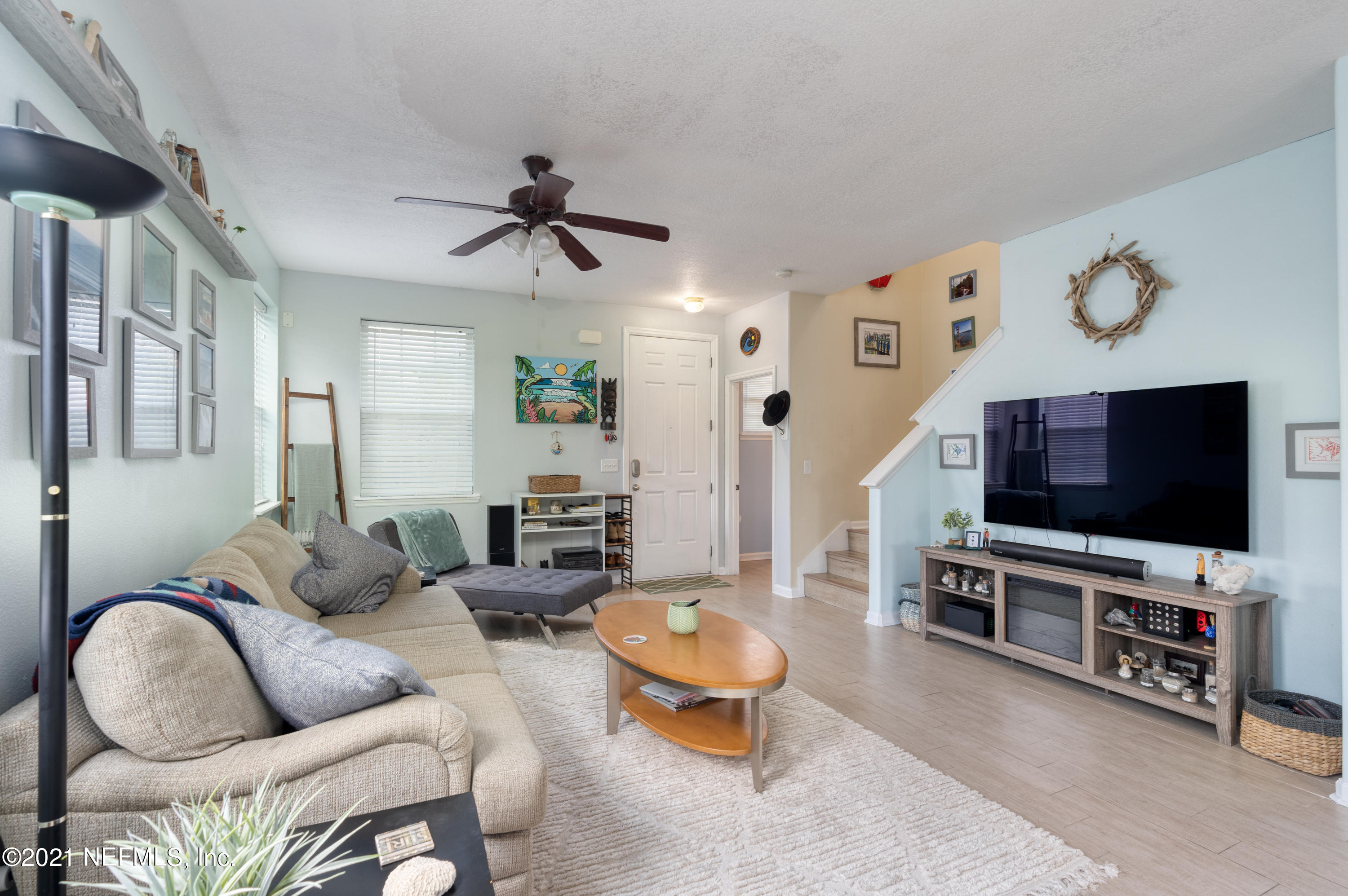 167 Bay Bridge Drive St. Augustine, FL 32080 - Photo 4 of 32 a living room with furniture and a flat screen tv