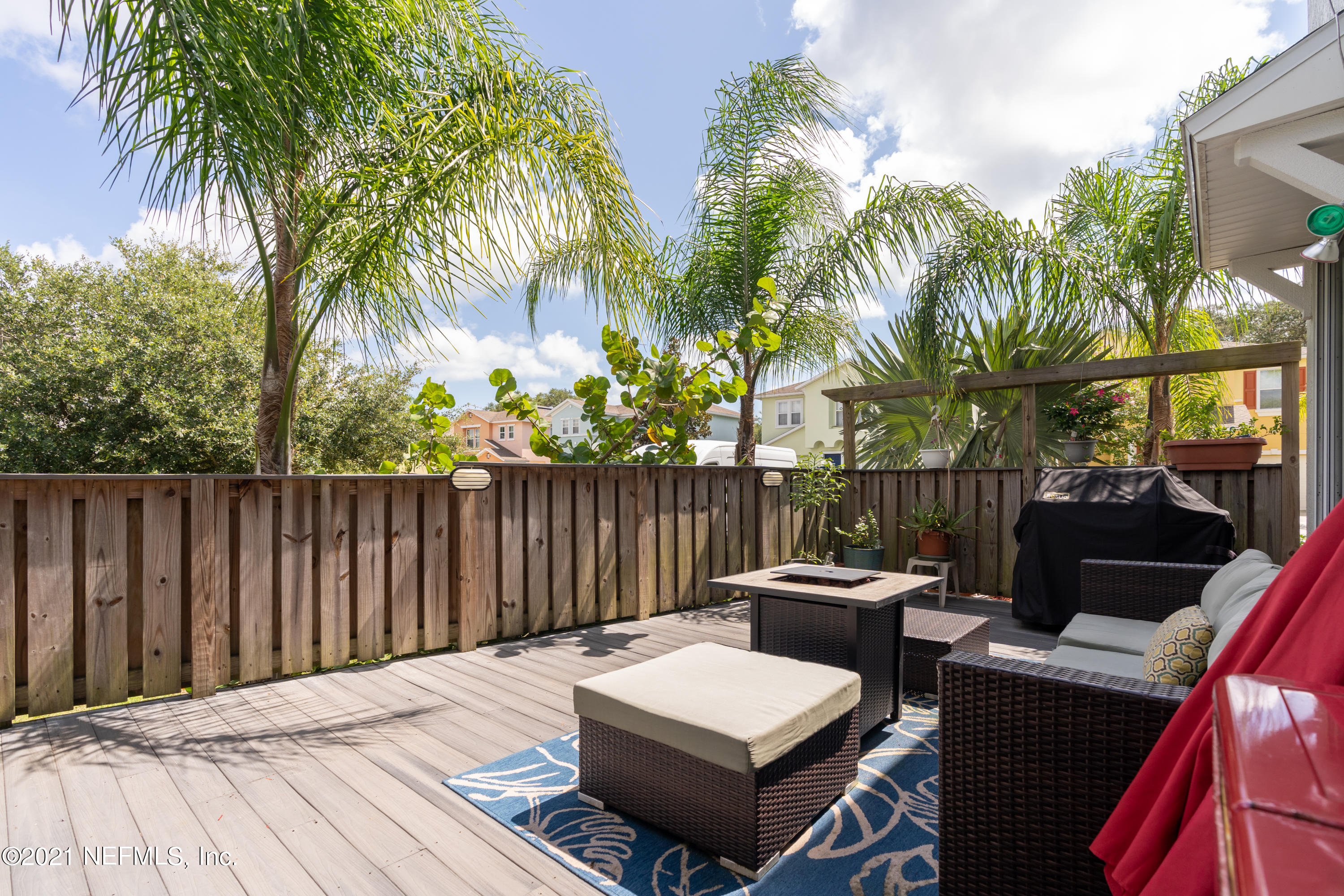 167 Bay Bridge Drive St. Augustine, FL 32080 - Photo 7 of 32 a view of a patio with two chairs and a table