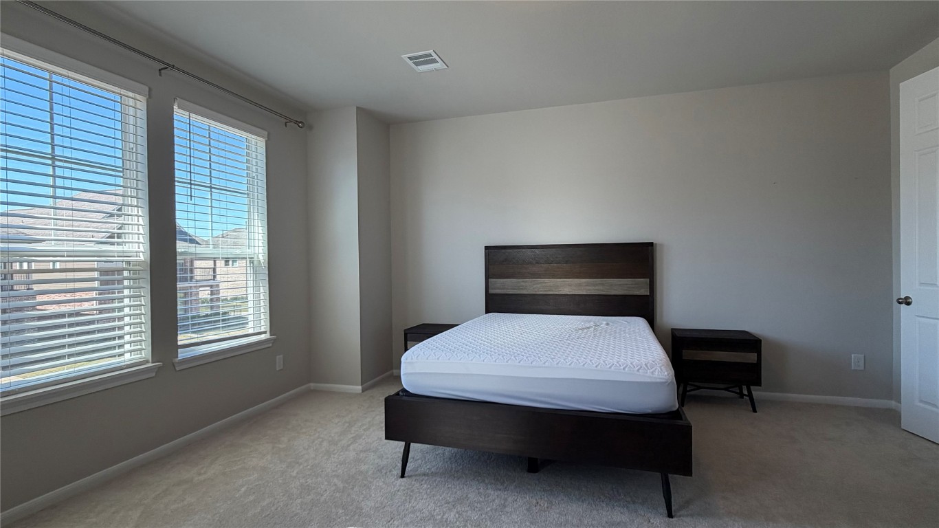 9404 Caddo Ridge Lane Cypress, TX 77433 - Photo 4 of 17 primary bedroom