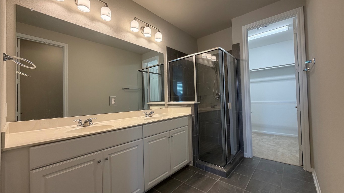 9404 Caddo Ridge Lane Cypress, TX 77433 - Photo 7 of 17 primary bathroom