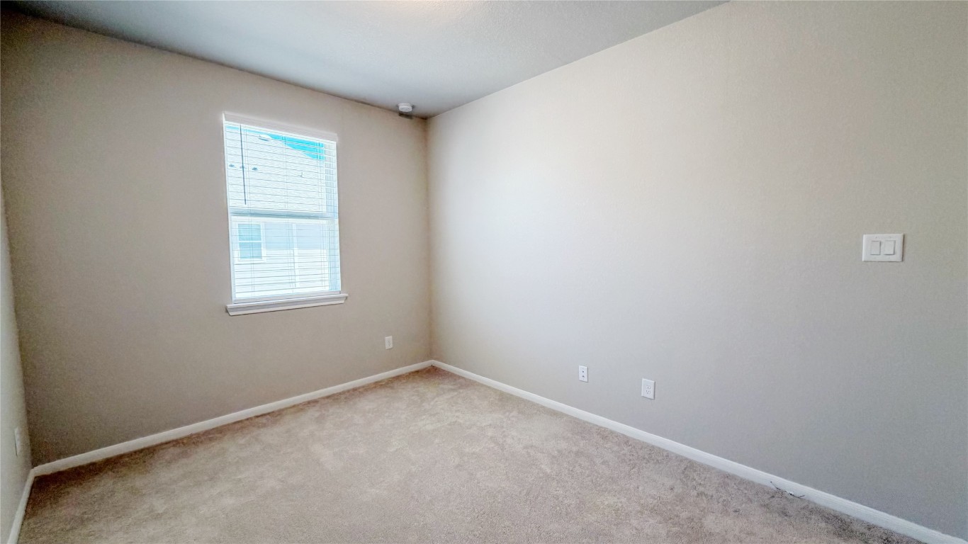 9404 Caddo Ridge Lane Cypress, TX 77433 - Photo 9 of 17 Third bedroom