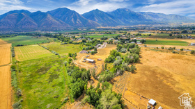 19 East Southfield Road Spanish Fork, UT 84660 - Photo 60 of 74 View of mountain background with rural landscape and farmland