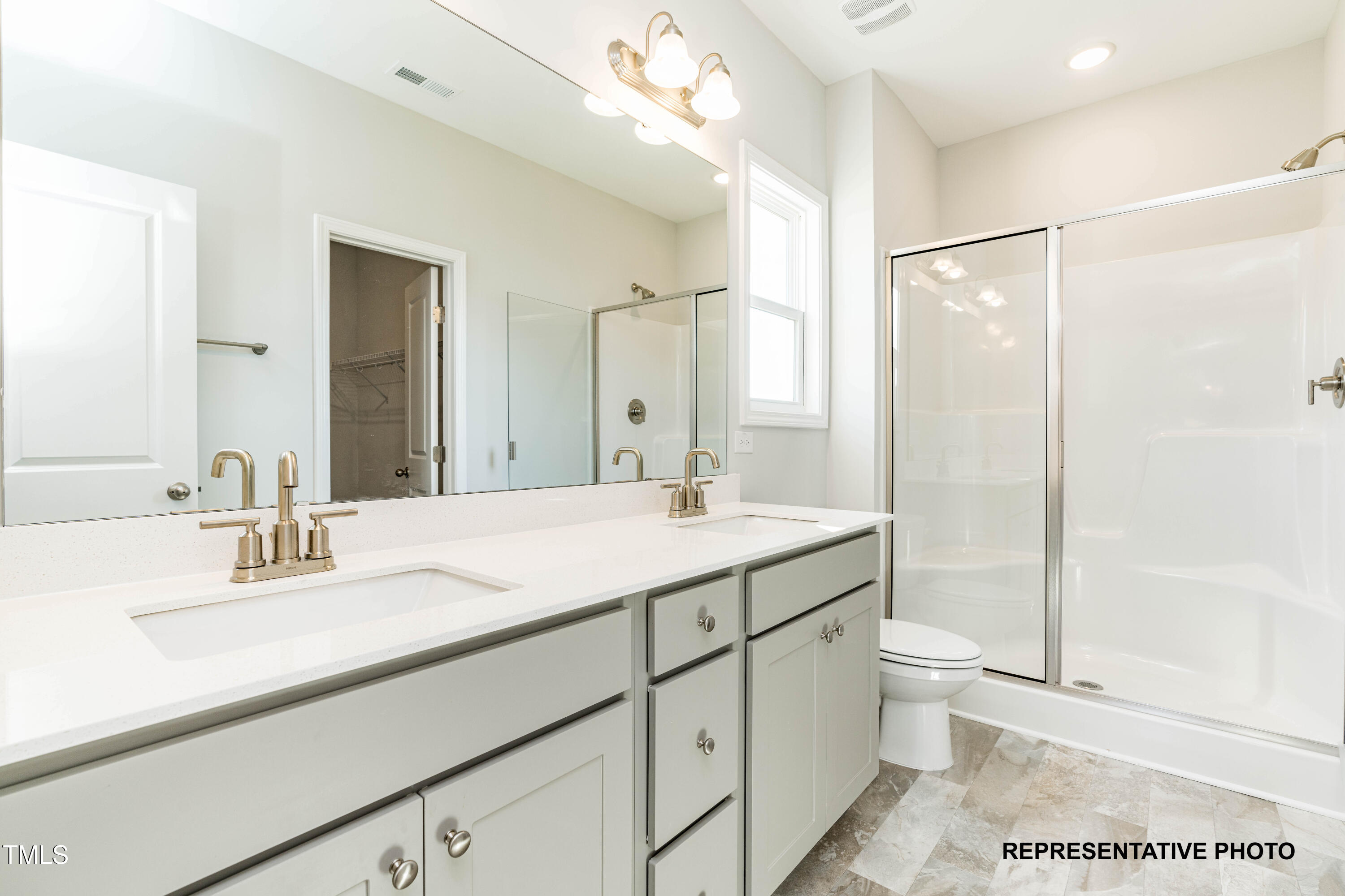 106 Legolas Court Middlesex, NC 27557 - Photo 10 of 11 a bathroom with a sink a toilet and shower