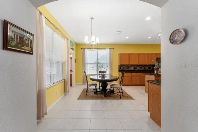 a kitchen with stainless steel appliances granite countertop a stove and a sink