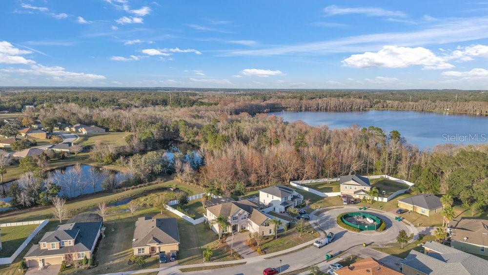 3463 Creek Run Lane Eustis, FL 32736 - Photo 4 of 83 a view of a lake in middle of the town