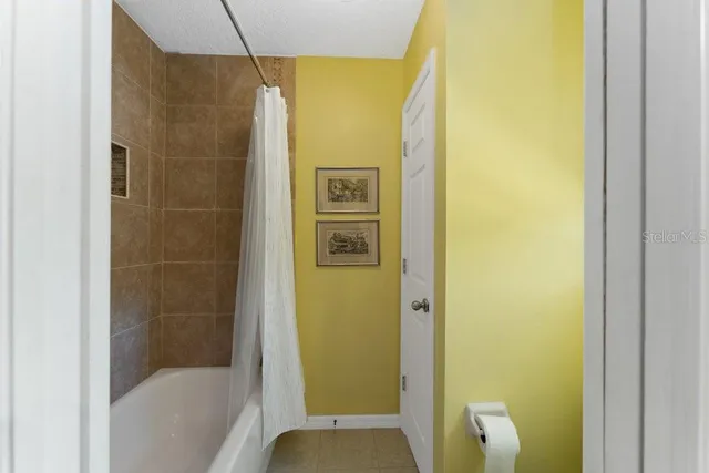 a view of kitchen with furniture and large window