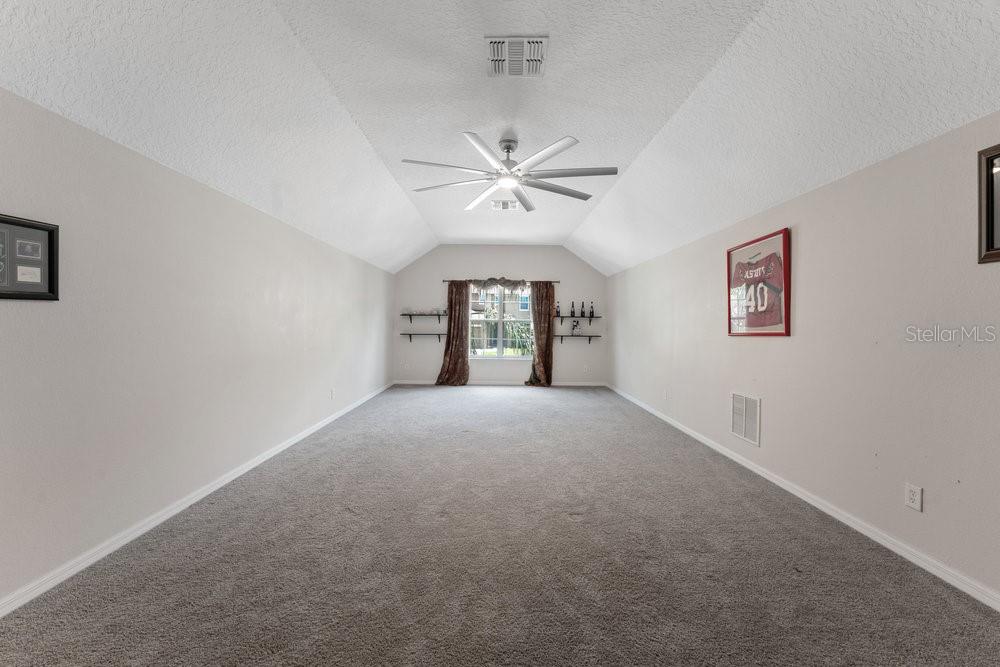 3463 Creek Run Lane Eustis, FL 32736 - Photo 60 of 83 a view of an empty room with a window