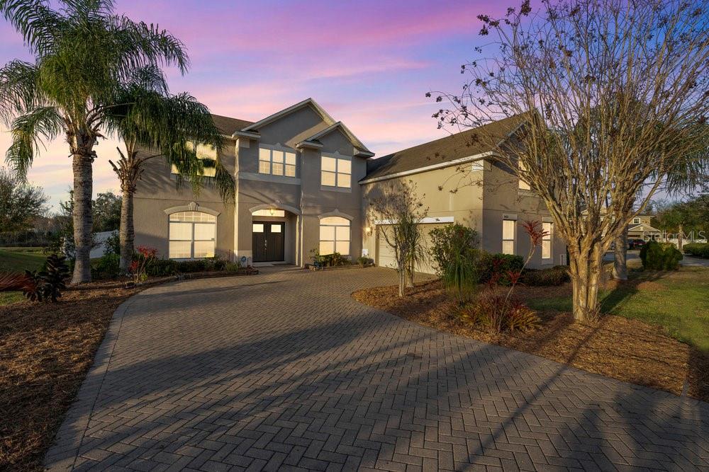 3463 Creek Run Lane Eustis, FL 32736 - Photo 6 of 83 a front view of a house with a yard