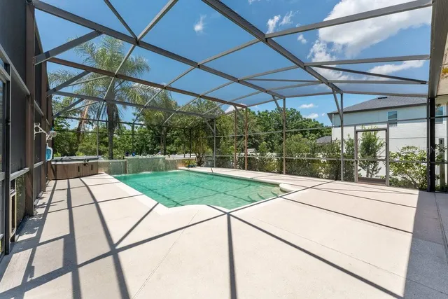 a view of a big yard with a house