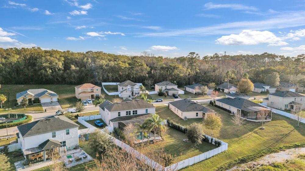 3463 Creek Run Lane Eustis, FL 32736 - Photo 77 of 83 a view of a lake with couches and city view
