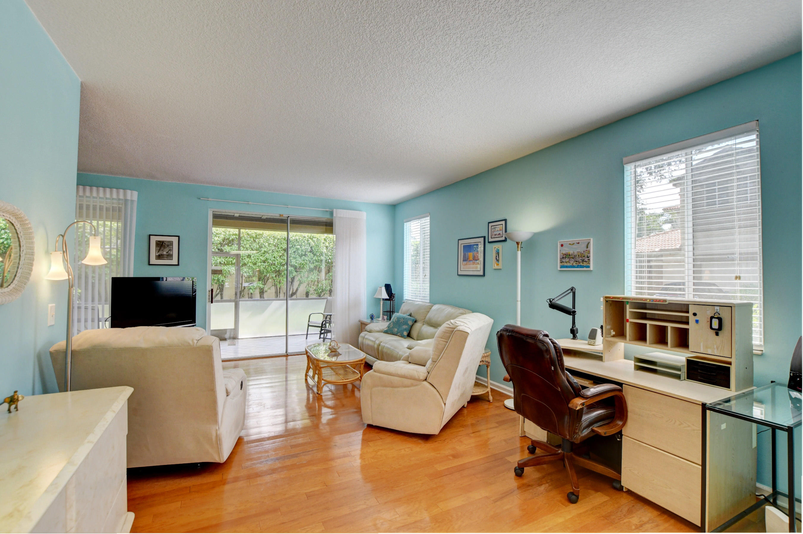 6746 Via Regina Boca Raton, FL 33433 - Photo 9 of 25 a living room with furniture window and a table