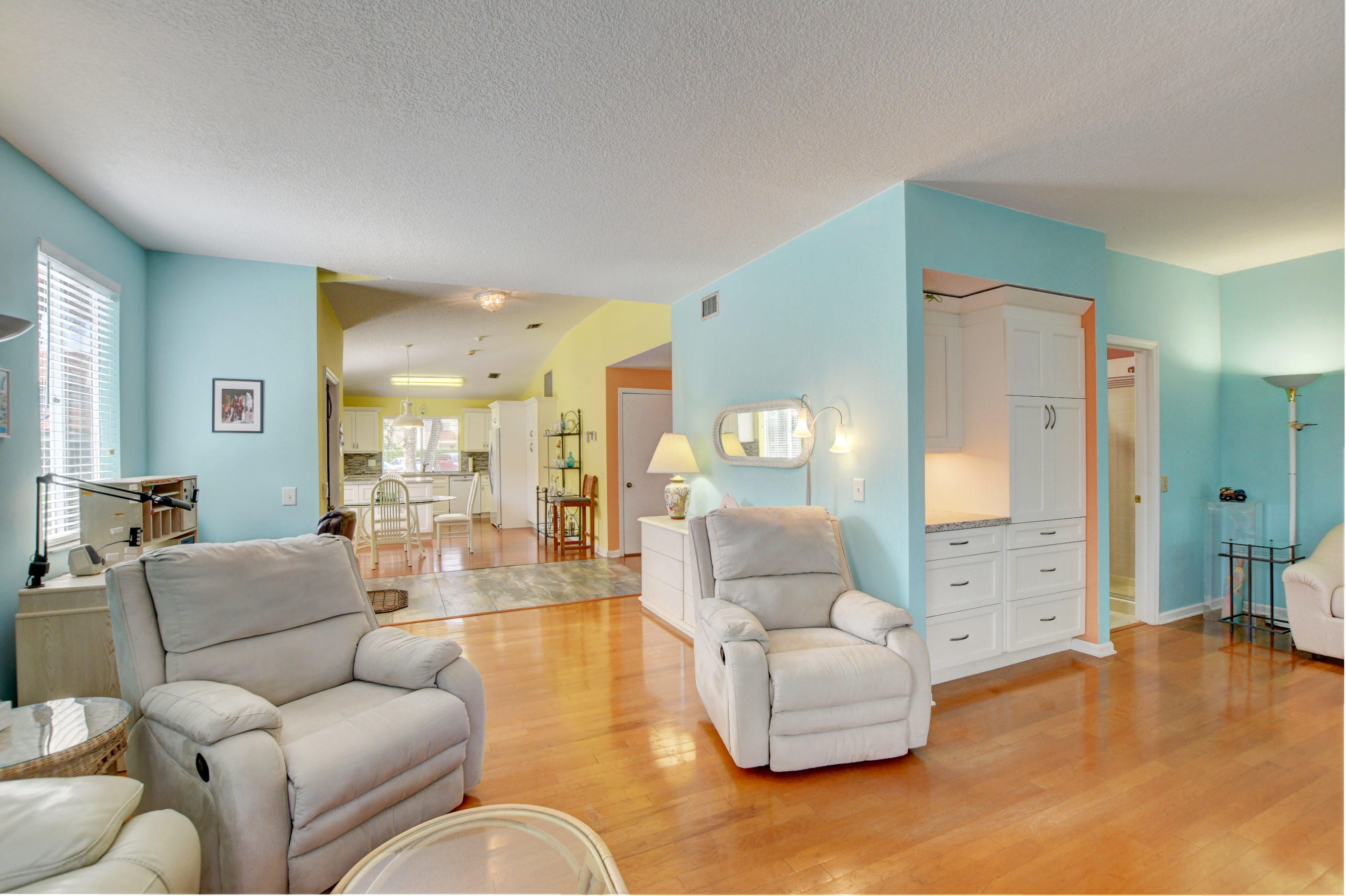 6746 Via Regina Boca Raton, FL 33433 - Photo 10 of 25 a living room with furniture and a large window