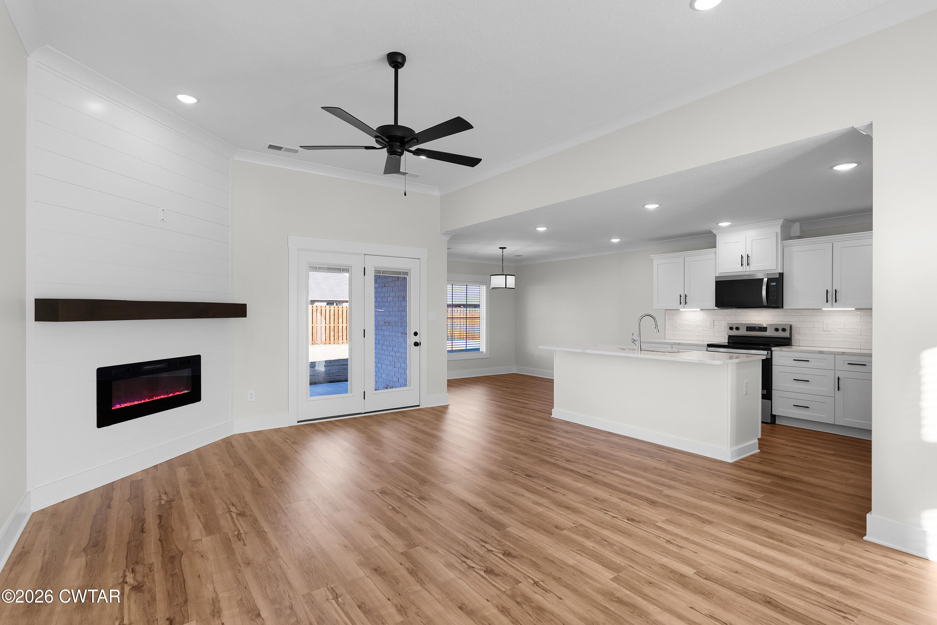 17 Easington Cove Jackson, TN 38305 - Photo 4 of 19 a view of kitchen with cabinets and wooden floor