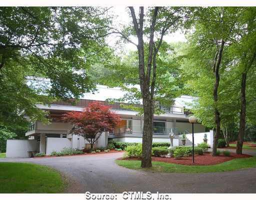 83 Peck Hill Road Woodbridge, CT 06525 - Photo 1 of 1 a view of a house with a tree in front of it